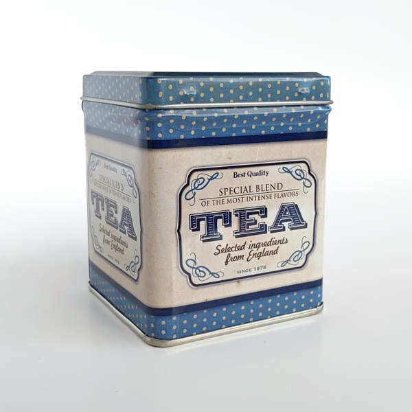 Boite à thé motif Tea Special Blend dans des tons bleu beige. Pour